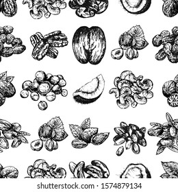 Seamless pattern of hand drawn sketch style different kinds of nuts isolated on white background. Vector illustration.