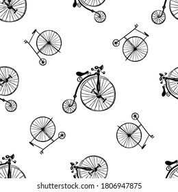 Seamless pattern of hand drawn sketch style penny-farthing bicycles isolated on white background. Vector illustration.