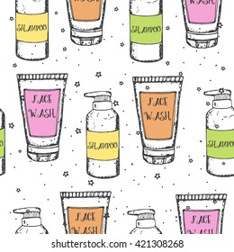 Seamless pattern with hand drawn sketch cosmetics: face wash, and shampoo. Vector stock illustration. Wrapping paper for beauty shop. 