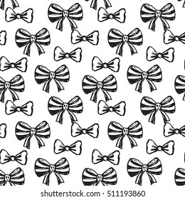 Seamless pattern with hand drawn sketch bows. Black and white vector holiday endless background