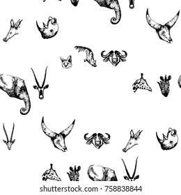 Seamless pattern of hand drawn sketch style African animals. Vector illustration isolated on white background.