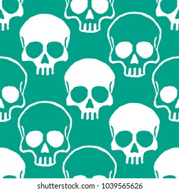 Seamless pattern with hand drawn skulls. Vector Illustration