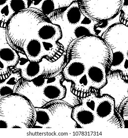 Seamless pattern with hand drawn skulls. Vector Illustration