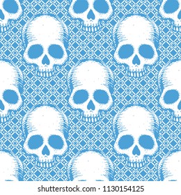Seamless pattern with hand drawn skulls. Vector Illustration