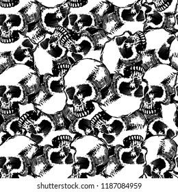 Seamless pattern with hand drawn skulls. Vector Illustration