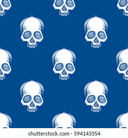 Seamless pattern with hand drawn skulls. Lapis Blue color. Vector Illustration