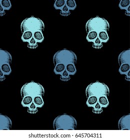 Seamless pattern with hand drawn skulls. Vector Illustration