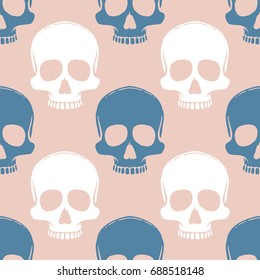 Seamless pattern with hand drawn skulls. Vector Illustration