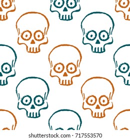 Seamless pattern with hand drawn skulls. Vector Illustration