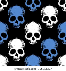 Seamless pattern with hand drawn skulls. Vector Illustration