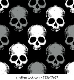 Seamless pattern with hand drawn skulls. Vector Illustration
