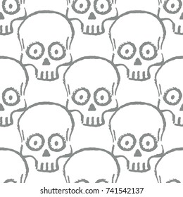 Seamless pattern with hand drawn skulls. Vector Illustration