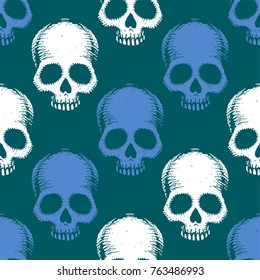 Seamless pattern with hand drawn skulls. Vector Illustration