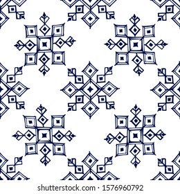 Seamless pattern with hand drawn snowflakes on white background. Suitable for packaging, wrappers, fabric design