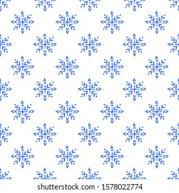 Seamless pattern with hand drawn snowflakes on white background. Suitable for packaging, wrappers, fabric design