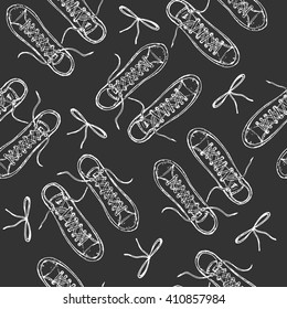 Seamless pattern with hand drawn sport shoes or sneakers with small bow on background. Wrapping paper. Vector stock illustration for shoe shop.