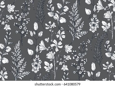 Seamless pattern with hand drawn spring flowers and plants in sketch style. Monochrome vector endless nature background
