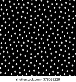 Seamless pattern with hand drawn stars in white on black background.