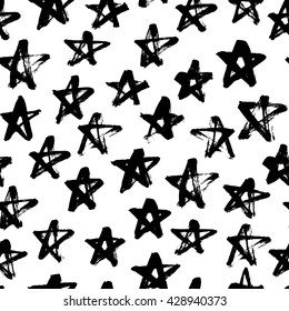 Seamless pattern with hand drawn starts. Modern brush calligraphy. Hand drawn lettering background. Ink illustration. Ornament for wrapping paper. Independence Day grungy stars.