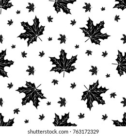 Seamless pattern with hand drawn striped maple leaves.