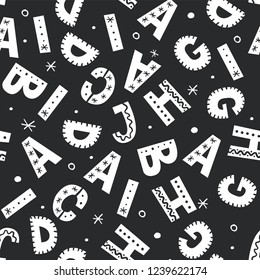 Seamless pattern with hand drawn style latin alphapet. Cut isolated vector illustration for your kids background, wallpaper design. Doodle sketch style. 