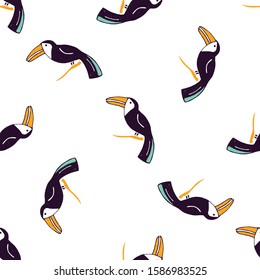 Seamless pattern with hand drawn toucans. Vector illustration with tropical doodle birds.