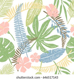 Seamless pattern of hand drawn tropical leaves and flowers.Vector illustration.