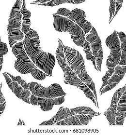 Seamless pattern with hand drawn tropical leaves. Trendy palm branches. Vector illustration