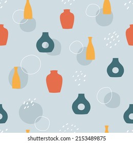 Seamless pattern of hand drawn vases. Blue, yellow and red clay pottery and abstract shapes on blue background