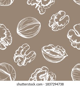 Seamless pattern. Hand drawn vector outline illustration of a walnut. Walnut kernels and shells. Handwritten graphic technique