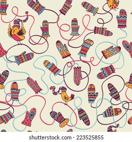 The seamless pattern with hand drawn vector mittens. Decoration. Winter background. The collection of doodle elements for your design.