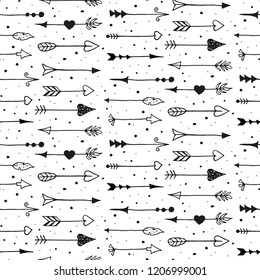 Seamless pattern with hand drawn vintage arrows. Vector illustration.
