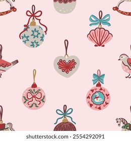 Seamless pattern of hand drawn vintage Christmas ornaments including baubles, heart, bird, scallop with bows on pink background. Vector design