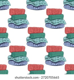 Patrón sin costuras con suéteres doblados de estilo vintage dibujados a mano. Ropa de punto acogedora en versión color. Ideal para textiles, papel de embalaje, marca de temporada y diseño de superficies.