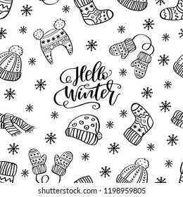 Seamless pattern with hand drawn warm clothes and handwritten phrase Hello Winter. Perfect vector holidays background