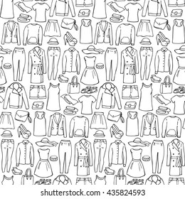 Seamless pattern of hand drawn woman clothes and accessories elements
