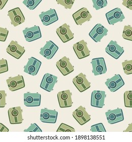 Seamless pattern with hand drown silhouette camera on color background. Business elements icons in doodle style, infographic. Fashion vector stock illustration for wallpaper, fabric, textile. 