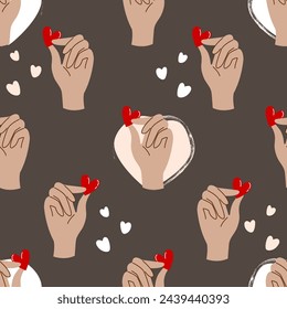 Seamless pattern with hand and heart. The concept of charity, care, love.