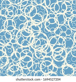 Seamless pattern with hand painted ink circles. Graphic design element for poster, stationary, fabric, scrapbook, baby shower card, wedding invitation. Grunge brush stroke texture. Vector illustration