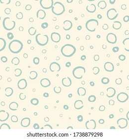 Seamless pattern with hand painted ink circles. Graphic design element for poster, stationary, fabric, scrapbook, baby shower card, wedding invitation. Grunge brush stroke texture. Vector illustration