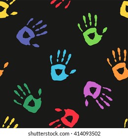 Seamless pattern with a hand prints