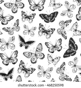 Seamless pattern with hand-drawn black silhouette butterflies on white background, vector illustration.