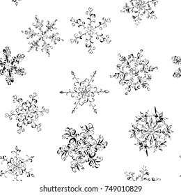 Seamless pattern of hand-drawn black-and-white snowflake with curls