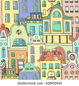 Seamless pattern of hand-drawn and colored houses.
