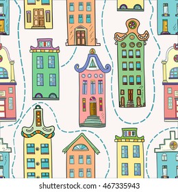 Seamless pattern of hand-drawn and colored houses.