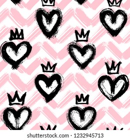 Seamless pattern with hand-drawn hearts and crowns on wavy, pink-striped background. Doodle style abstract wallpaper. Cute, romantic, girly design.