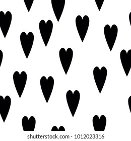 Seamless pattern with hand-drawn hearts. Ink grungy heart background, doodle. Endless texture can be used for printing onto fabric and paper or invitation. Abstract geometric shapes. Vector