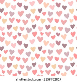 Seamless pattern of hand-drawn hearts in pink, purple and beige colors. Vector image for Valentine's Day, lovers, prints, clothes, textiles, cards, holidays, children, baby shower, wrapping paper.