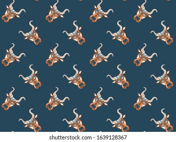 Seamless pattern of hand-drawn mystical heads of bulls hand-drawn on a dark background. Symbols of the zodiac sign Taurus. Cattle. Orange and cream colors. For fabric, clothing, wrapping paper. Vector