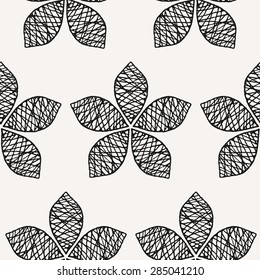 Seamless pattern with hand-drawn ornate leaves. Monochrome floral decorative elements repeat pattern.